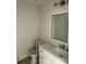 Bathroom with a white vanity and a combined shower-tub at 25 W Edwards St, Plant City, FL 33563