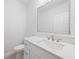 Modern bathroom features a large mirror, white cabinetry, and stylish sink at 25 W Edwards St, Plant City, FL 33563