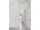 Hallway with access to bedrooms and bathroom at 25 W Edwards St, Plant City, FL 33563