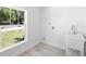 Laundry room featuring a large window, new sink, and laundry connections at 25 W Edwards St, Plant City, FL 33563