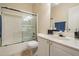 Clean bathroom features a shower over tub, toilet, vanity and sink at 2733 Via Cipriani # 814A, Clearwater, FL 33764