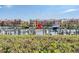View of the community docks on the water with building in background on a bright sunny day at 2733 Via Cipriani # 814A, Clearwater, FL 33764
