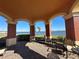 Picturesque outdoor gazebo overlooking a tranquil waterfront, perfect for relaxation and enjoying scenic views at 2733 Via Cipriani # 814A, Clearwater, FL 33764