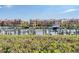 Scenic waterfront view of residences with boat docks along a tranquil canal at 2733 Via Cipriani # 814A, Clearwater, FL 33764