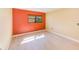 Bedroom with hardwood floors, light walls and natural light from window at 2995 Flint S Dr, Clearwater, FL 33759