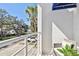 Exterior balcony view with white railing, wicker furniture, and neighborhood views at 3117 W Barcelona St # A, Tampa, FL 33629