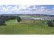 Sprawling view of the community highlighting the nearby pond and ample green space at 32817 Leonard Rd, San Antonio, FL 33576