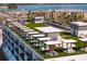 Rooftop terrace with multiple seating areas, shade and waterfront views at 400 150Th Ave # 206, Madeira Beach, FL 33708