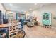 Bright living room with wood-look flooring and an open concept layout at 450 Harbor Springs Dr, Palm Harbor, FL 34683