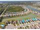Overhead view of a community boasting multiple lakes and organized street layouts at 4727 Lindever Ln, Palmetto, FL 34221