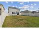 Spacious backyard featuring white vinyl fencing offering an outdoor living space at 4727 Lindever Ln, Palmetto, FL 34221