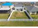 Expansive fenced backyard featuring lush green grass and a peaceful, private outdoor space at 4727 Lindever Ln, Palmetto, FL 34221