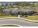 Community clubhouse featuring attractive architecture, lush landscaping, and neighborhood views at 4727 Lindever Ln, Palmetto, FL 34221