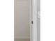 Hallway showing trim and an electrical outlet with lightly textured walls at 4727 Lindever Ln, Palmetto, FL 34221