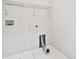 This laundry room offers shelving, outlets, and hookups for a washer and dryer at 4727 Lindever Ln, Palmetto, FL 34221