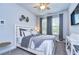 Relaxing bedroom with a ceiling fan, neutral walls, and carpet floors at 6113 Plover Meadow St, Lithia, FL 33547