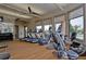 Well-equipped fitness center with treadmills, elliptical machines, and weights for a complete workout experience at 6113 Plover Meadow St, Lithia, FL 33547