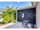 Covered lanai with screened enclosure, offering a relaxing outdoor living space with patio seating at 6113 Plover Meadow St, Lithia, FL 33547