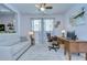 Office features lots of natural light, a desk, comfortable seating and stylish décor at 6113 Plover Meadow St, Lithia, FL 33547