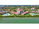 Aerial view of waterfront condo community with access to a pool, and the arrow showing the unit location at 6268 Palma Del Mar S Blvd # 113, St Petersburg, FL 33715