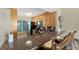 Well-lit kitchen with stainless steel appliances, granite countertops, and a breakfast bar, perfect for casual dining at 6268 Palma Del Mar S Blvd # 113, St Petersburg, FL 33715