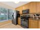 This functional kitchen has stainless steel appliances, including a large refrigerator, offering efficient meal preparation at 6268 Palma Del Mar S Blvd # 113, St Petersburg, FL 33715
