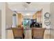 Cozy kitchen with stainless steel appliances, granite countertops, and bar seating for entertaining guests at 6268 Palma Del Mar S Blvd # 113, St Petersburg, FL 33715