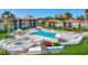 Beautiful condo community swimming pool and lounging areas and the arrow showing the unit location at 6268 Palma Del Mar S Blvd # 113, St Petersburg, FL 33715