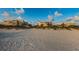 Beautiful beachfront property featuring white sand and inviting resort style buildings, perfect for coastal living at 6500 Sunset Way # 501, St Pete Beach, FL 33706