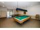 Game room with a pool table, ping pong table, and a view to the outside at 6500 Sunset Way # 501, St Pete Beach, FL 33706