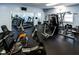 Well-equipped community gym with treadmills, weight machines, and mirrored walls for a complete fitness experience at 6500 Sunset Way # 501, St Pete Beach, FL 33706