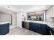 Well appointed kitchen with stainless steel appliances and bright lighting at 6500 Sunset Way # 501, St Pete Beach, FL 33706