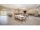 A large meeting room with tables, chairs, neutral colors and lots of lighting, great for gatherings at 6500 Sunset Way # 501, St Pete Beach, FL 33706