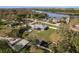 Expansive property with pool, fenced yard, and outbuildings, as seen from above at 6705 Myrna Dr, Tampa, FL 33619