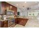 Modern kitchen features stainless steel appliances, granite countertops, and ample cabinet space at 6705 Myrna Dr, Tampa, FL 33619