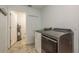 Clean laundry room features a modern washer and dryer at 6705 Myrna Dr, Tampa, FL 33619