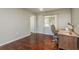 Office features hardwood floors, bright natural light, and plenty of space for focus and productivity at 6705 Myrna Dr, Tampa, FL 33619