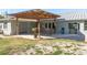 Covered patio with counter and backyard view at 6705 Myrna Dr, Tampa, FL 33619