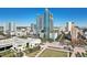 Panoramic aerial view featuring downtown buildings, lush parks, and urban scenery on a sunny day at 777 N Ashley Dr # 915, Tampa, FL 33602