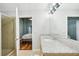 Bathroom featuring granite countertop, wood cabinets, and a glass shower at 777 N Ashley Dr # 915, Tampa, FL 33602