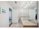 Bathroom features double sinks with granite countertop at 777 N Ashley Dr # 915, Tampa, FL 33602