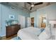 Bedroom features light blue walls and a ceiling fan at 777 N Ashley Dr # 915, Tampa, FL 33602