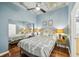 Bedroom with mirrored closet doors and hard wood floors at 777 N Ashley Dr # 915, Tampa, FL 33602