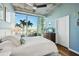 Comfortable bedroom with an outside view, ceiling fan, and an area rug at 777 N Ashley Dr # 915, Tampa, FL 33602