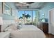 Bright bedroom boasts a comfortable king bed, stylish decor, and expansive windows showcasing the city skyline at 777 N Ashley Dr # 915, Tampa, FL 33602