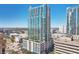 Stunning high-rise condominium building with modern architecture, private balconies, and a rooftop pool at 777 N Ashley Dr # 915, Tampa, FL 33602