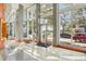 Bright condo lobby with floor-to-ceiling windows and stylish seating at 777 N Ashley Dr # 915, Tampa, FL 33602