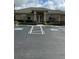 The community clubhouse features accessible parking and well manicured landscaping at 8480 Southern Charm Cir, Brooksville, FL 34613