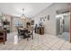 Inviting dining room featuring neutral paint, tile floors, decorative light fixture and lots of natural light at 868 Timber Pond Dr, Brandon, FL 33510