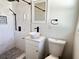 The bathroom has a black rainfall showerhead, modern vessel sink, and new toilet at 9 N Aurora Ave, Clearwater, FL 33765